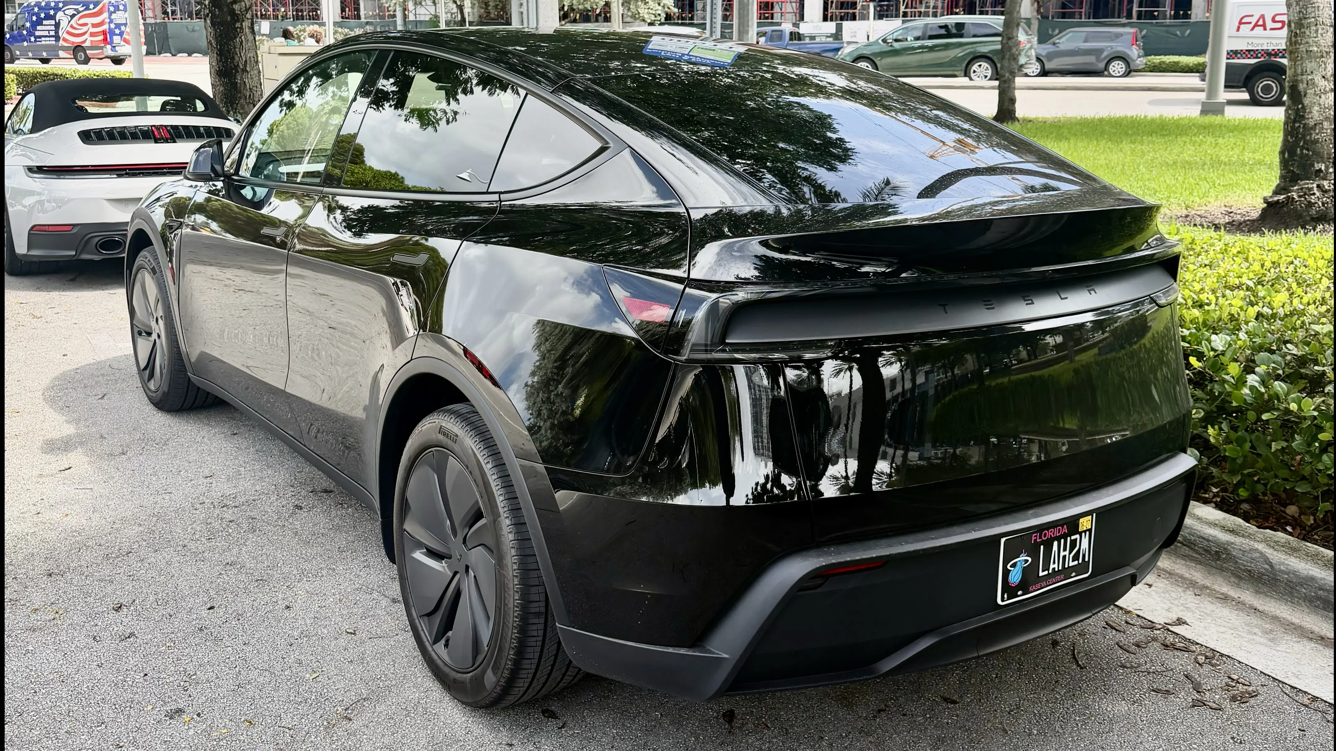 2026 Tesla Model Y in black — photo 2